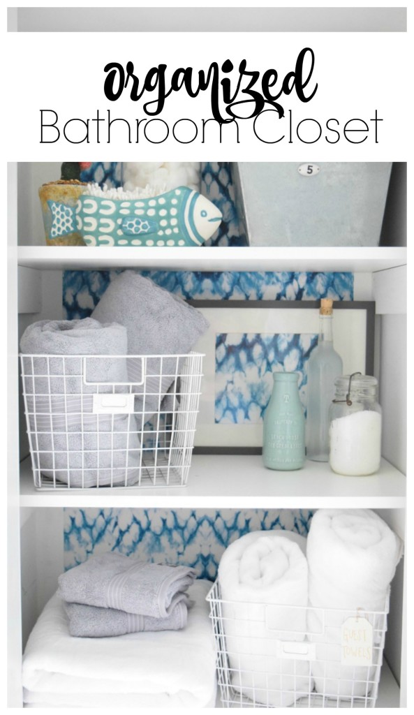 Organizing a closet in a bathroom with wallpaper