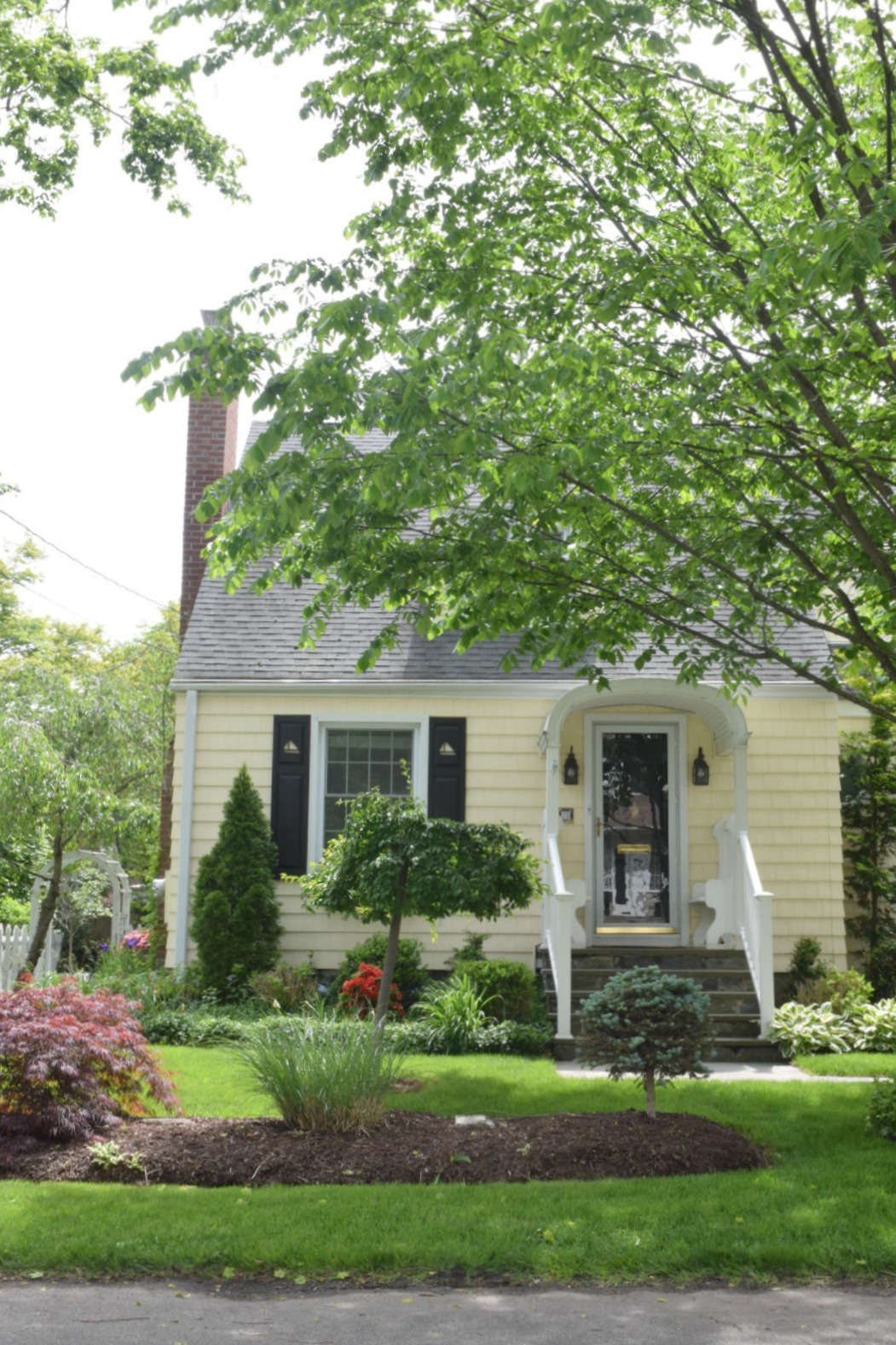 New England Homes- Exterior Paint Color Ideas - Nesting With Grace