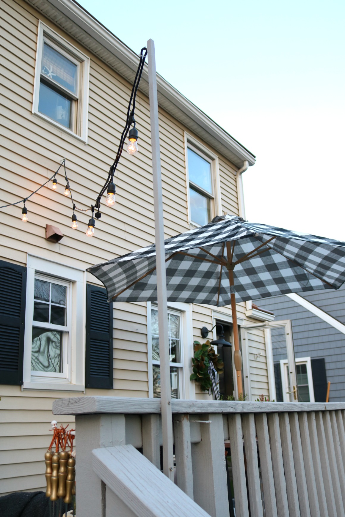 outside lights for house on How We Hung Our Deck String Lights Privacy Screen And Artwork Outside Nesting With Grace