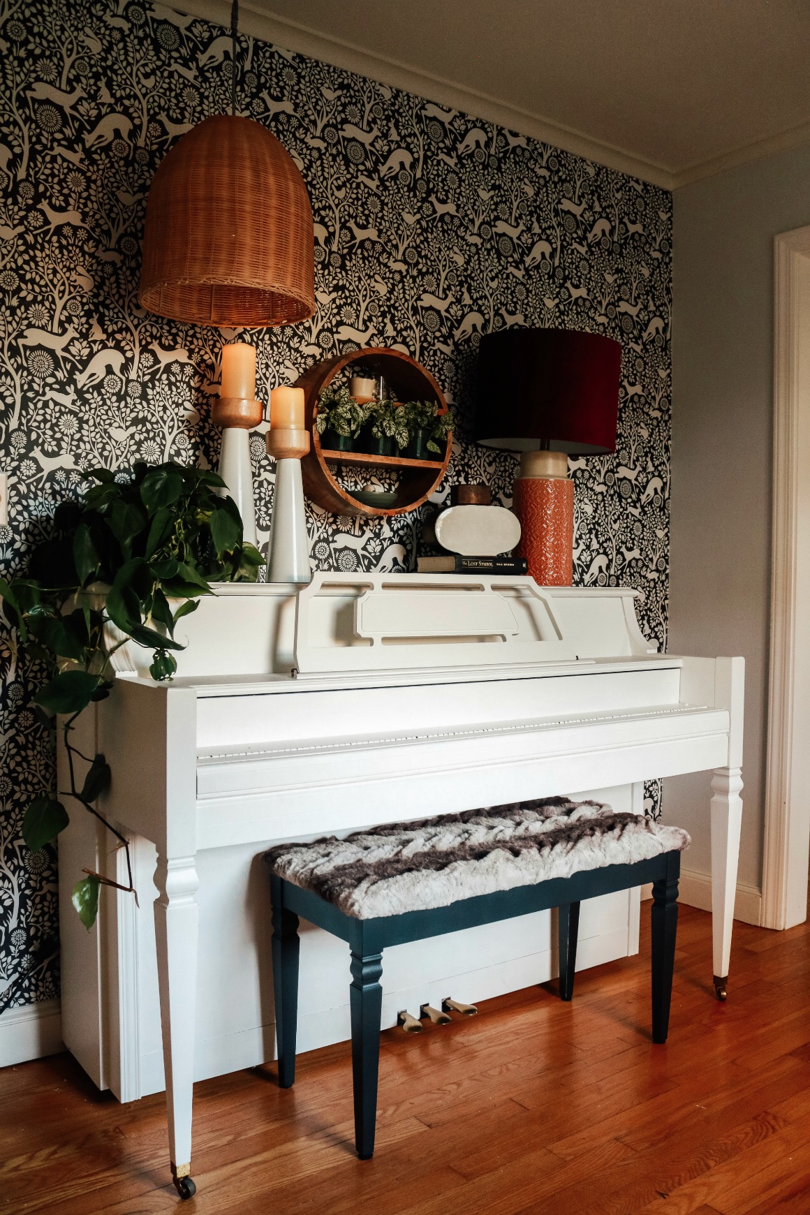 Painted White Piano with Wallpaper Accent Wall