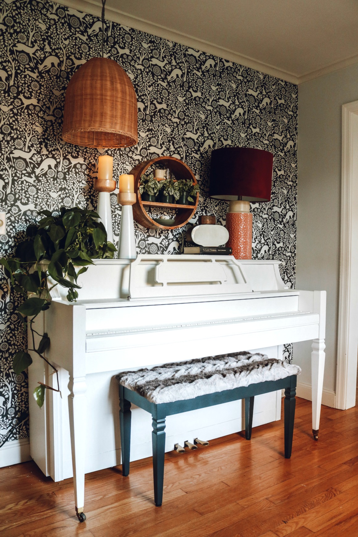 Painted White Piano with Wallpaper Accent Wall