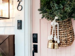 Christmas Front Porch with Fresh Greens and Pink Front Door