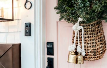 Christmas Front Porch with Fresh Greens and Pink Front Door