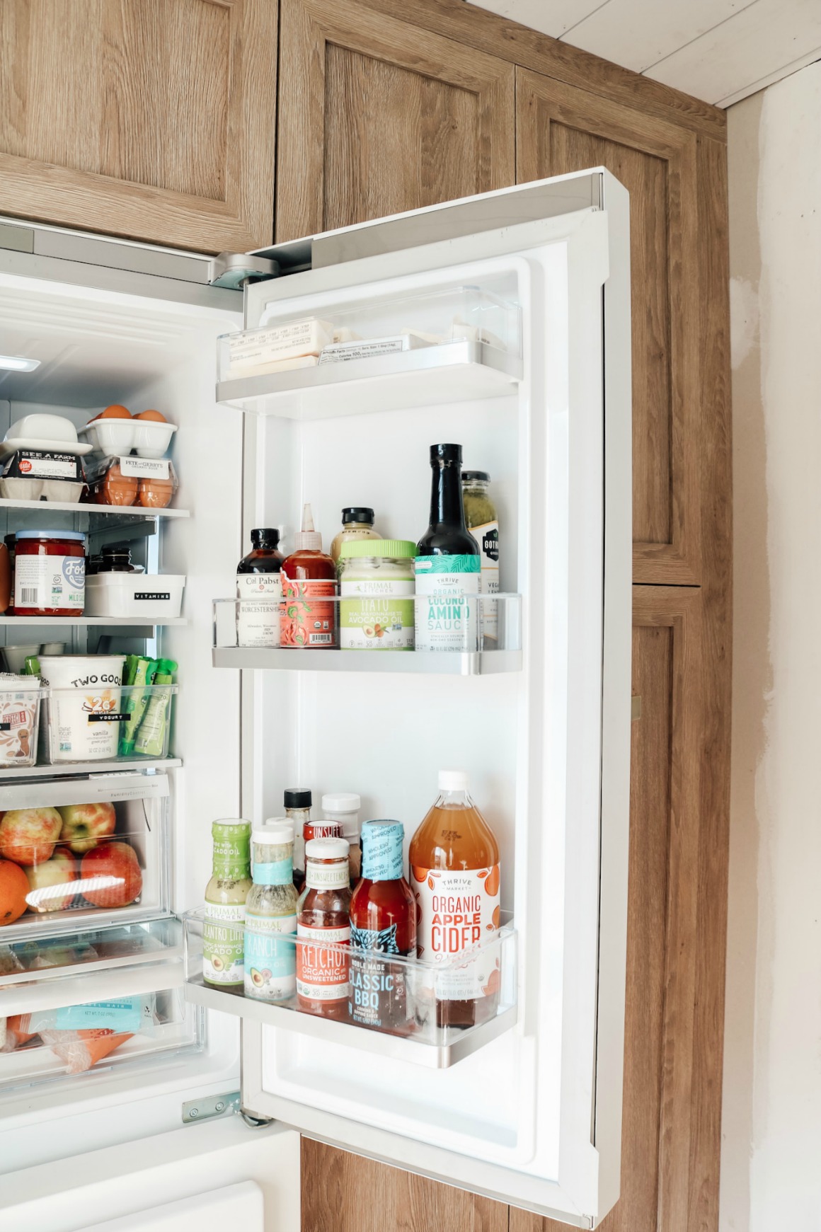 Inside our Fridge and Favorite things to Organize Fridge - Nesting With  Grace