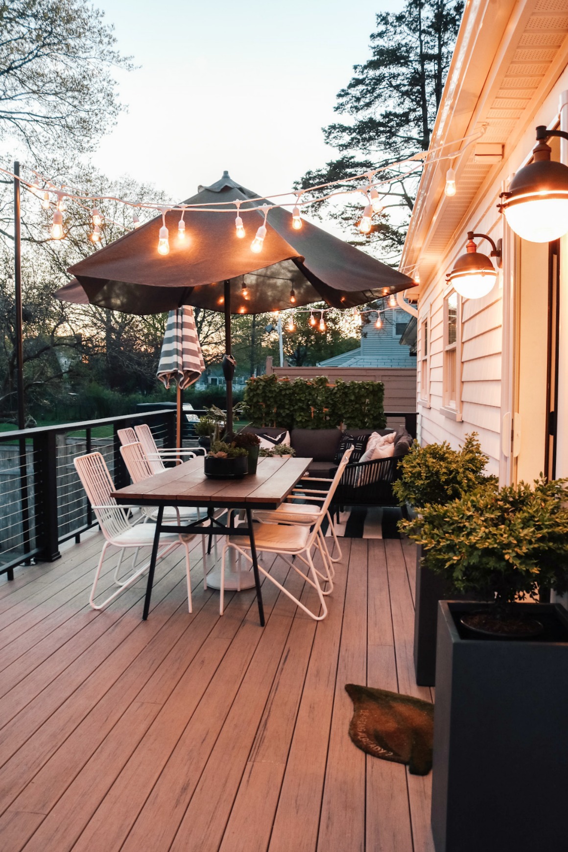 deck over living space construction on Our New Timbertech Deck With Contemporary Rail And String Lights Nesting With Grace