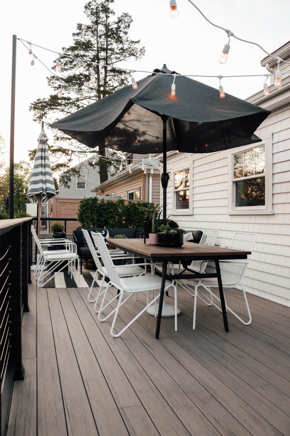 deck construction cost estimator on Our New Timbertech Deck With Contemporary Rail And String Lights Nesting With Grace