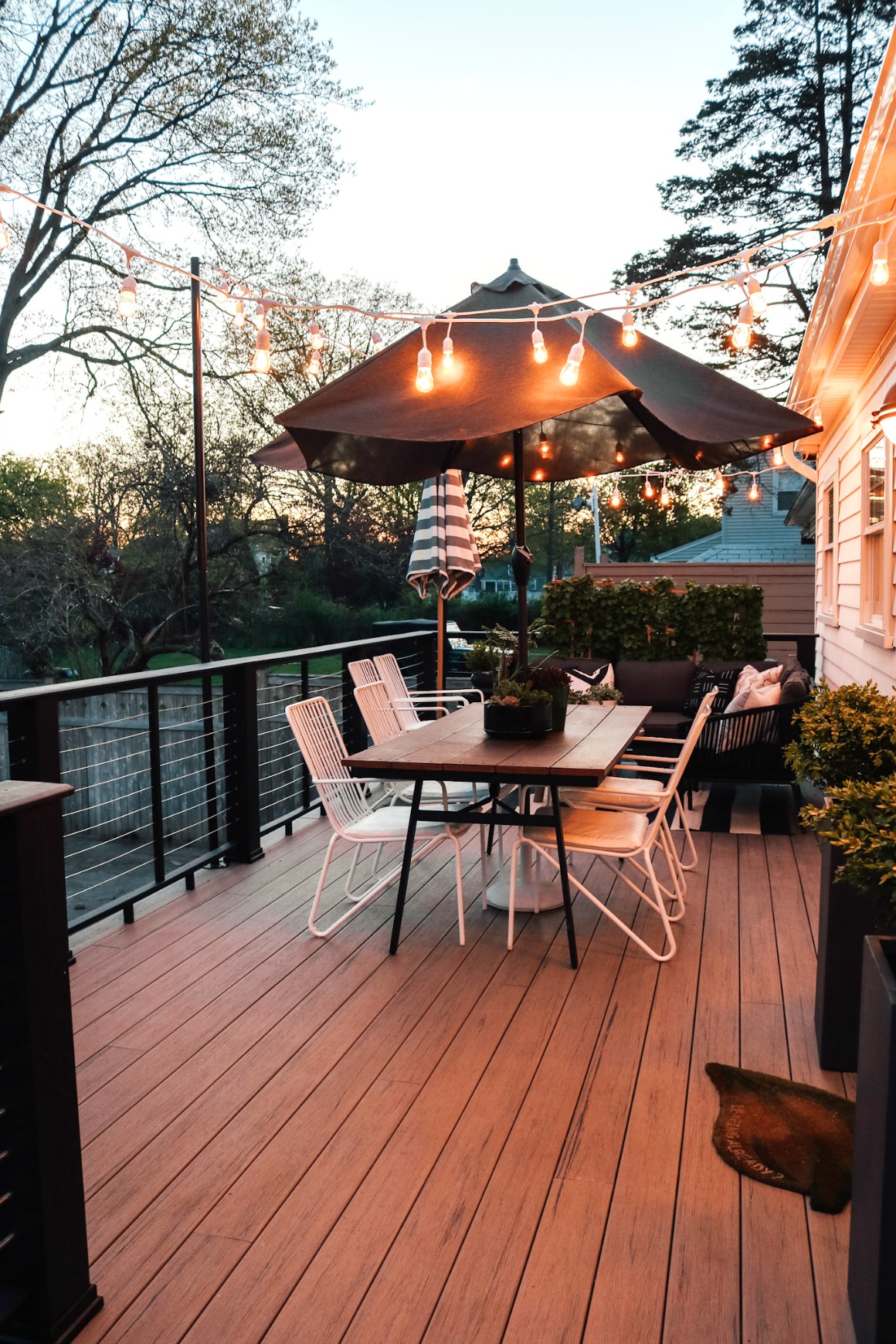 deck construction cost estimator on Our New Timbertech Deck With Contemporary Rail And String Lights Nesting With Grace