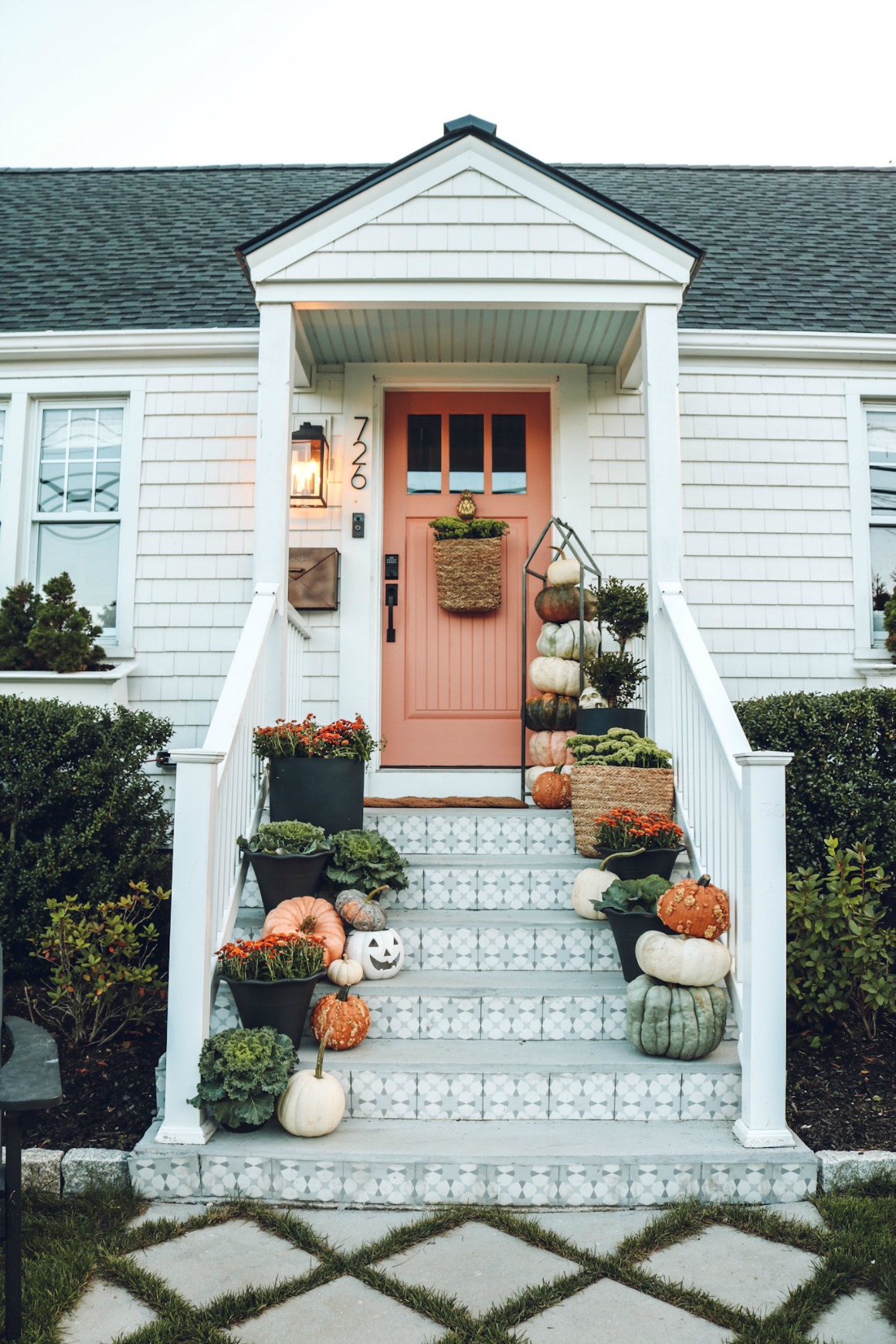 Fall front porch ideas- Salmon Door- Pink Door- Tile Front Steps- Sherwin Williams Salmon River Run