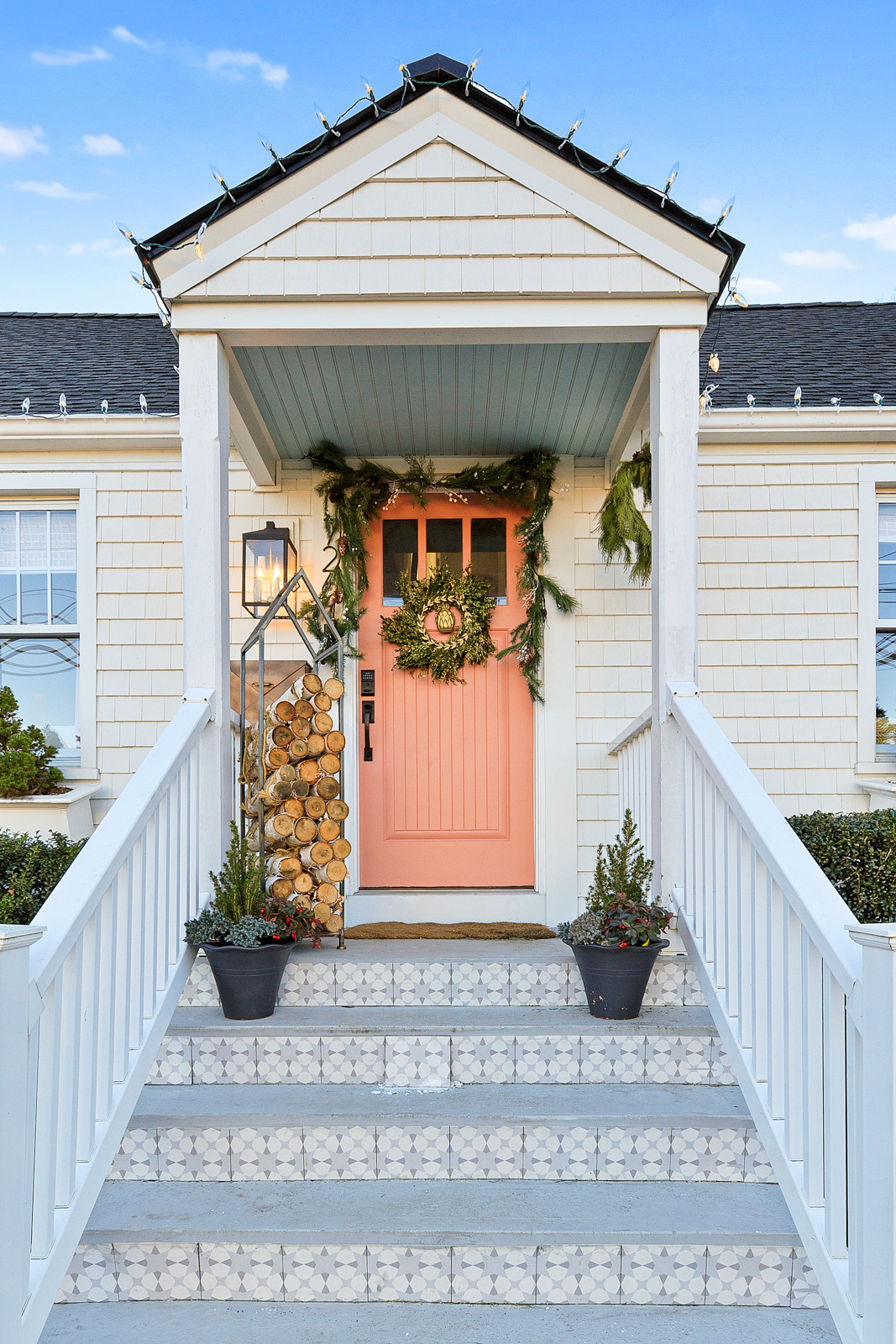 Tour our Small 1300 Square Foot Cape Small House Ideas White Shake Shingle Home Pink front door White Kitchen 