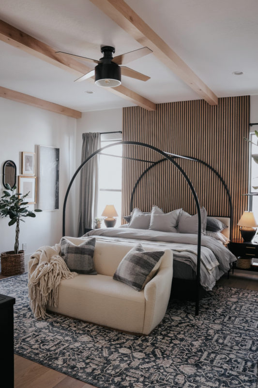 Primary Bedroom with Wood Accent Wall and Canopy Bed (In-laws home ...